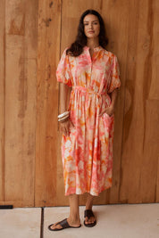 Model Genericm wearing size sample of the Nia Dress – Floral in colour Floral, from the front