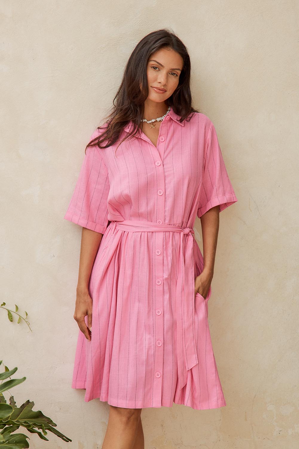 Model Genericm wearing size sample of the Palm Shirt Dress – Pinkteal in colour Pinkteal, in a cropped view