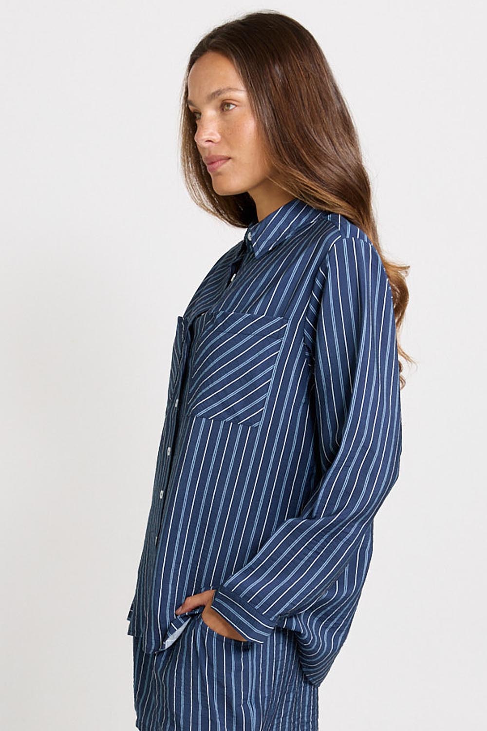 Model Genericm wearing size sample of the Sorrento Shirt – Blue in colour Blue, from an angle