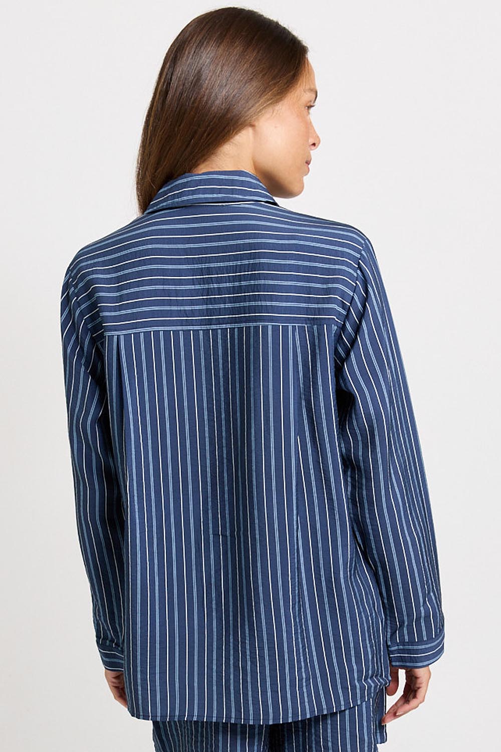 Model Genericm wearing size sample of the Sorrento Shirt – Blue in colour Blue, from the back
