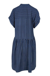 Product shot of the Sandy Dress – Blue in colour Blue, from the back