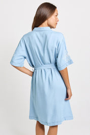 Model Genericm wearing size sample of the Emmy Shirt Dress – Midwash in colour Midwash, from the back