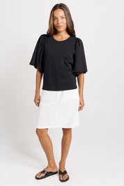 Model Genericm wearing size sample of the Bianca Broderie T-Shirt – Black in colour Black, from the front