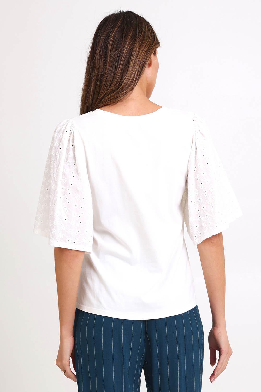 Model Madelinec wearing size 10 of the Bianca Broderie T-Shirt – White in colour White, from the back