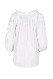 Product shot of the Daisy Broderie Blouse – White in colour White, from the back