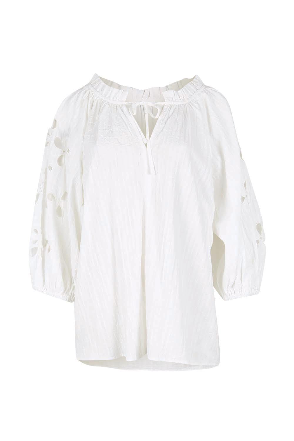 Product shot of the Daisy Broderie Blouse – White in colour White, from the front