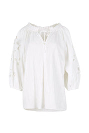 Product shot of the Daisy Broderie Blouse – White in colour White, from the front