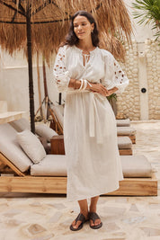 Model Genericm wearing size sample of the Daisy Broderie Dress - White in colour White, from the front