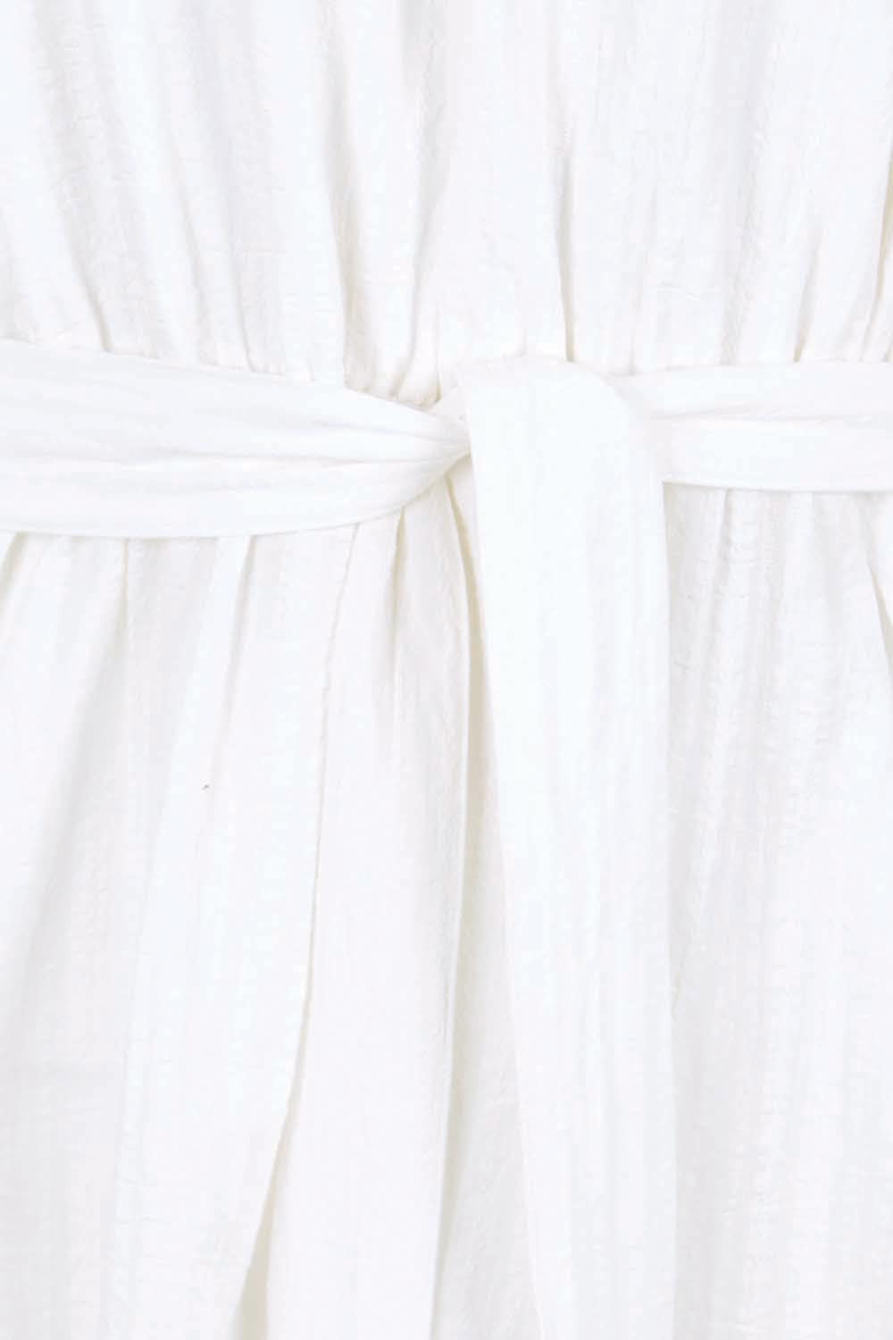 Product shot of the Nia Dress – White in colour White, showing detail