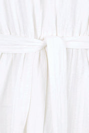 Product shot of the Nia Dress – White in colour White, showing detail