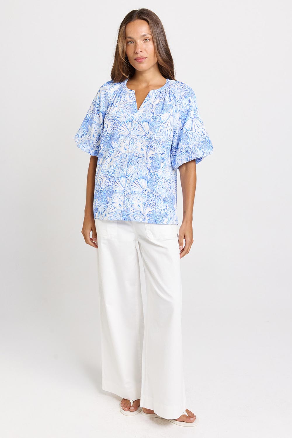 Model Genericm wearing size sample of the Bronte Blouse – Blueshell in colour Blueshell, from the front