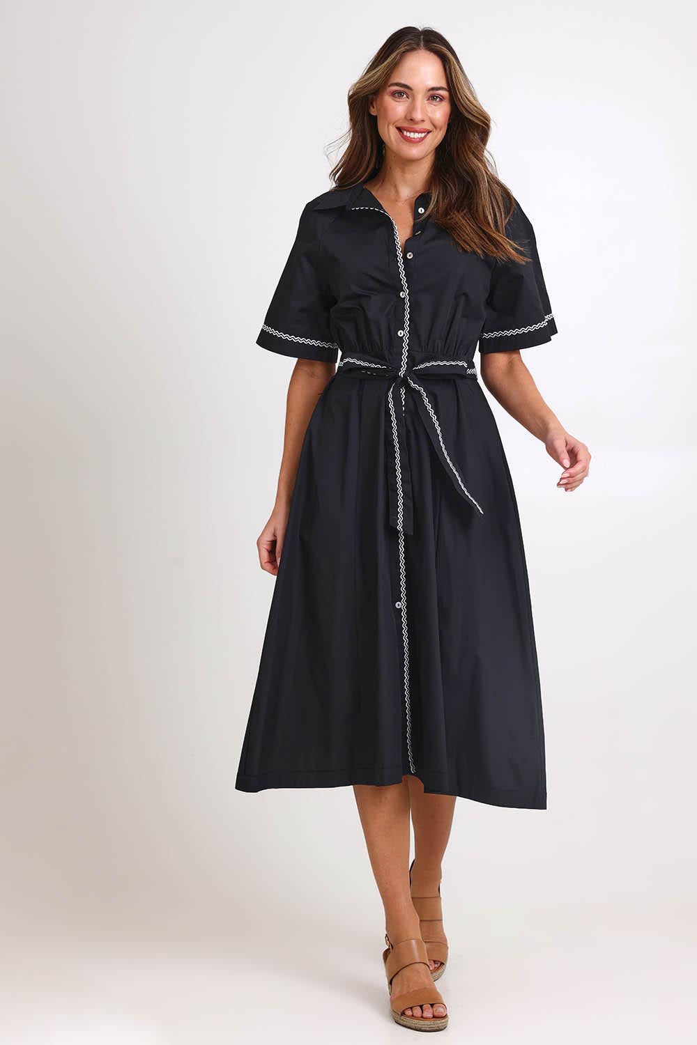 Model Madelinec wearing size 10 of the Lucy Shirt Dress – Black in colour Black, from the front