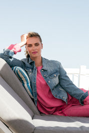 A model wearing the Hudson Denim Jacket in colour Vintage (Blue), from the front, showing the whole outfit