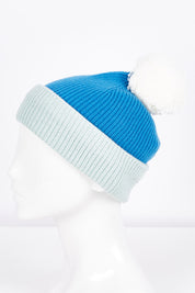 A model wearing size OneSize of the Dorothy Beanie in colour Ultramarin (Blue), from the front, showing the whole outfit