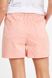 Model Madeline wearing size 10 of the Debbie Denim Jogger Shorts in colour Peachpink (Pink), from the back