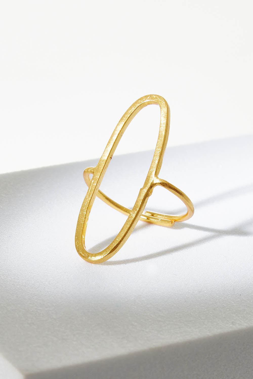 A model wearing size OneSize of the Adjustable Brass Oval Ring in colour Goldbrass (Metallics), from the front, showing the whole outfit
