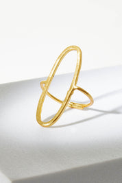 A model wearing size OneSize of the Adjustable Brass Oval Ring in colour Goldbrass (Metallics), from the front, showing the whole outfit