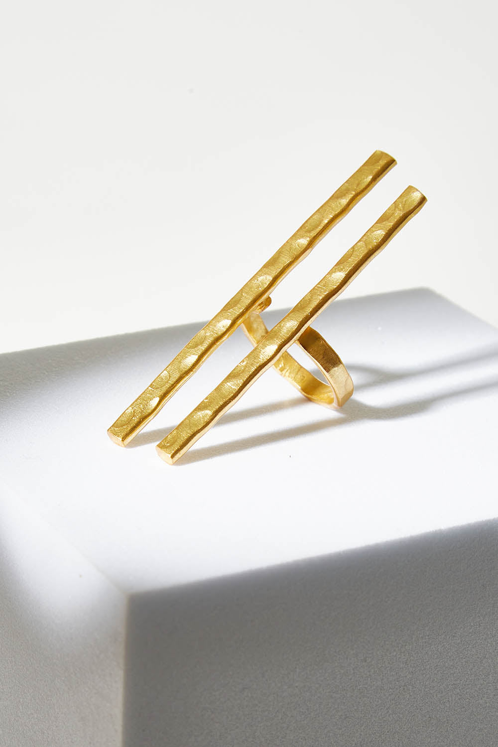 A model wearing size OneSize of the Adjustable Hammered Brass Double Bar Ring in colour Goldbrass (Metallics), from the front, showing the whole outfit