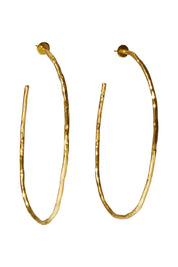 Product shot of the Brass Hammered Oversize Open Hoop Earrings in colour Goldbrass (Metallics), from the front