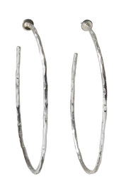 Product shot of the Brass Hammered Oversize Open Hoop Earrings in colour Silvbrass (Metallics), from the front