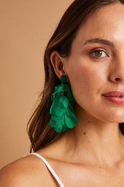 A model wearing size OneSize of the Bunch of Colour Earrings in colour Green (Green), from the front, showing the whole outfit