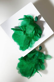 A model wearing size OneSize of the Bunch of Colour Earrings in colour Green (Green), from the front, showing the whole outfit