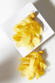 A model wearing size OneSize of the Bunch of Colour Earrings in colour Yellow, from the front, showing the whole outfit