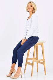 Model Emma wearing size 10 of The Best Seller Pant in colour Navy (Blue), from the front, showing the whole outfit