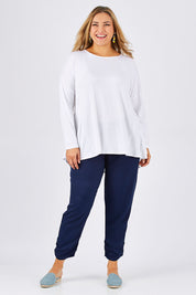 Model Ljubenka wearing size 18 of The Best Seller Pant in colour Navy (Blue), from the front, showing the whole outfit