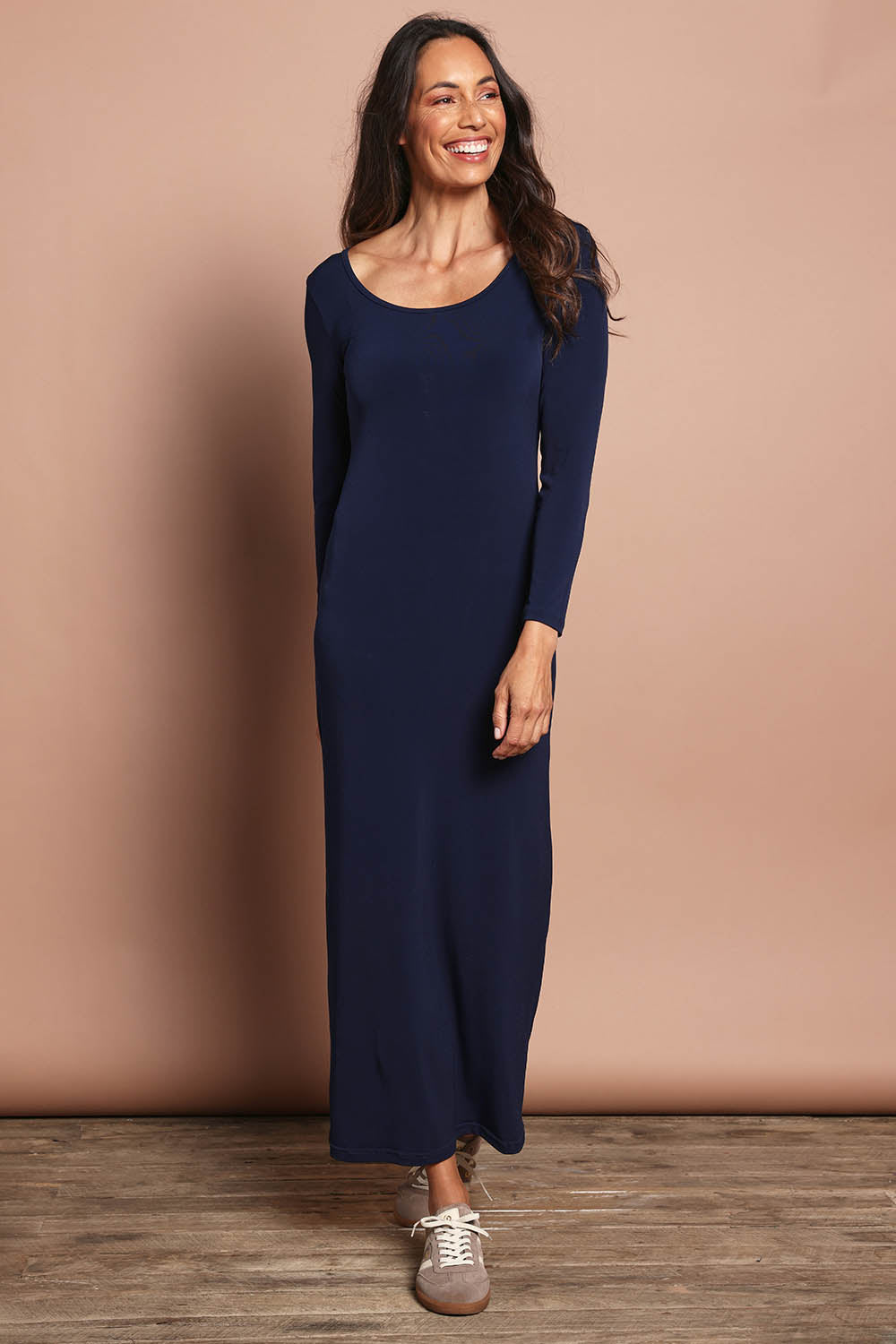 Model Amanda wearing size 10 of The Long Sleeve Comfort Maxi in colour Navy (Blue), from the front, showing the whole outfit
