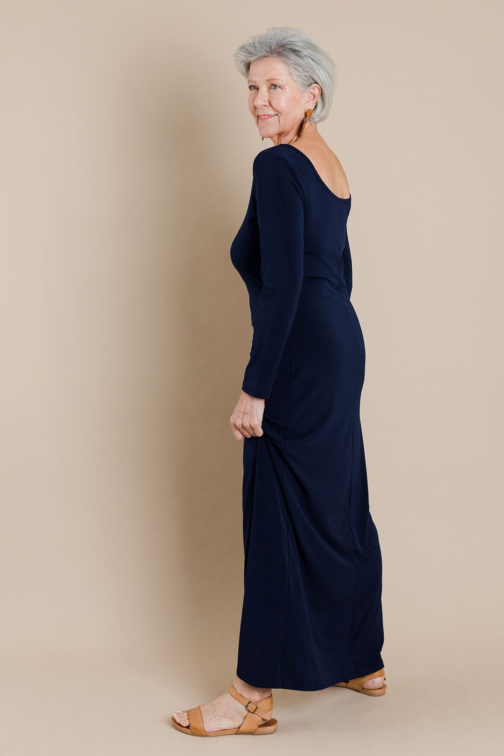 Model Elise wearing size 10 of The Long Sleeve Comfort Maxi in colour Navy (Blue), from the front, showing the whole outfit