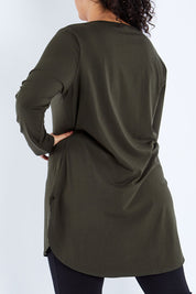 Model Sasha-Lee wearing size 16 of The Cotton Long Sleeve Boyfriend Tee in colour Khaki (Green), from the back