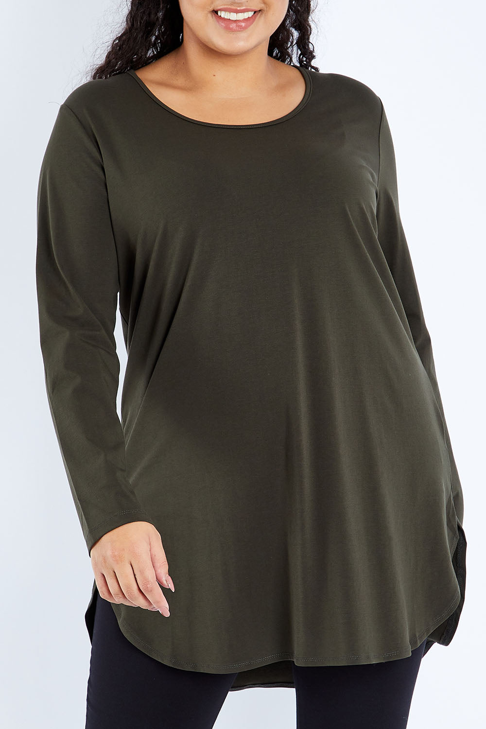 Model Sasha-Lee wearing size 16 of The Cotton Long Sleeve Boyfriend Tee in colour Khaki (Green), from the front, cropped image