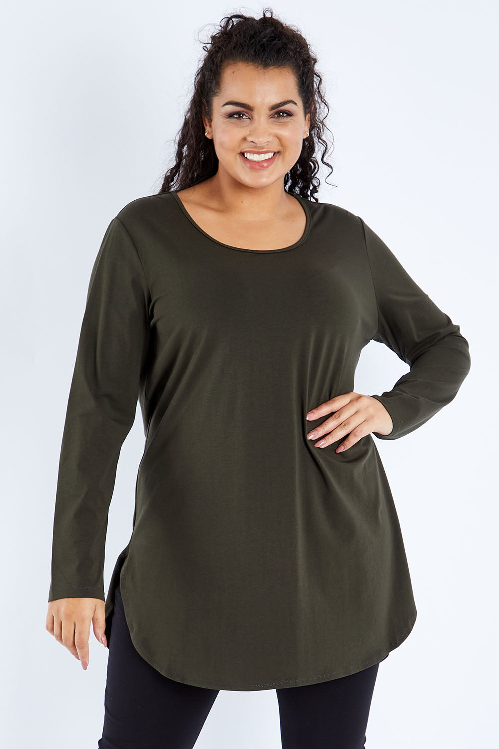 Model Sasha-Lee wearing size 16 of The Cotton Long Sleeve Boyfriend Tee in colour Khaki (Green), from the front, cropped image