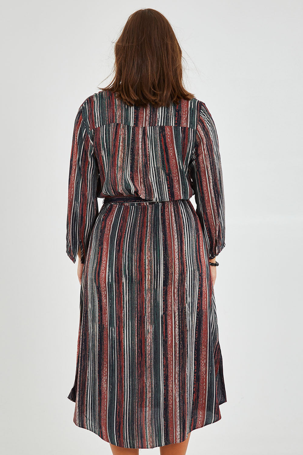 Model Monique wearing size 14 of The Wrap Front Midi Dress in colour Multistrip (Black), from the back