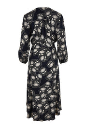 Product shot of The Wrap Front Midi Dress in colour Navytaupe (Blue), from the back