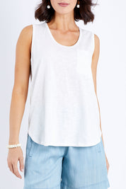 Model Andrea wearing size 10 of The Long Line Tank in colour White (White), from the front, cropped image
