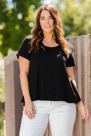 Model Laura wearing size 14 of The Short Sleeve Swing Tee in colour Black (Black), from the front, showing the whole outfit