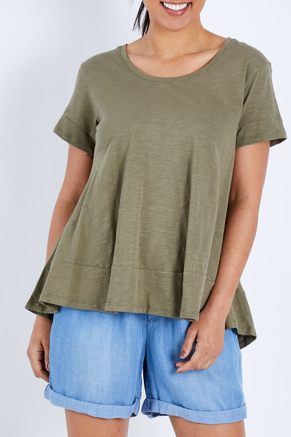Model Pamela wearing size 10 of The Short Sleeve Swing Tee in colour Khaki (Green), from the front, cropped image