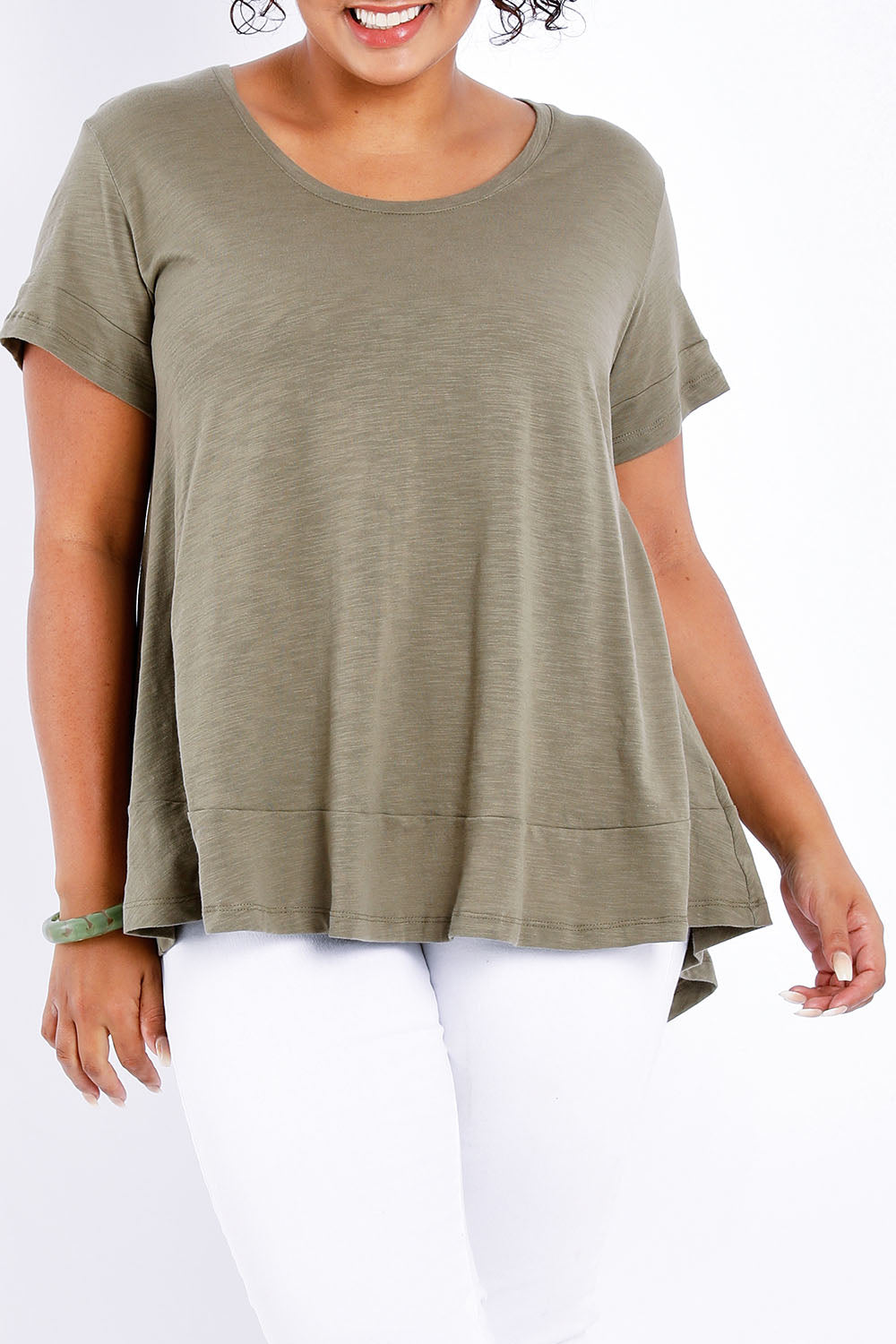Model Sasha-Lee wearing size 16 of The Short Sleeve Swing Tee in colour Khaki (Green), from the front, cropped image