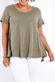 Model Sasha-Lee wearing size 16 of The Short Sleeve Swing Tee in colour Khaki (Green), from the front, cropped image