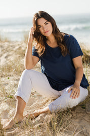 Model Laura wearing size 14 of The Short Sleeve Swing Tee in colour Navy (Blue), from the front, showing the whole outfit