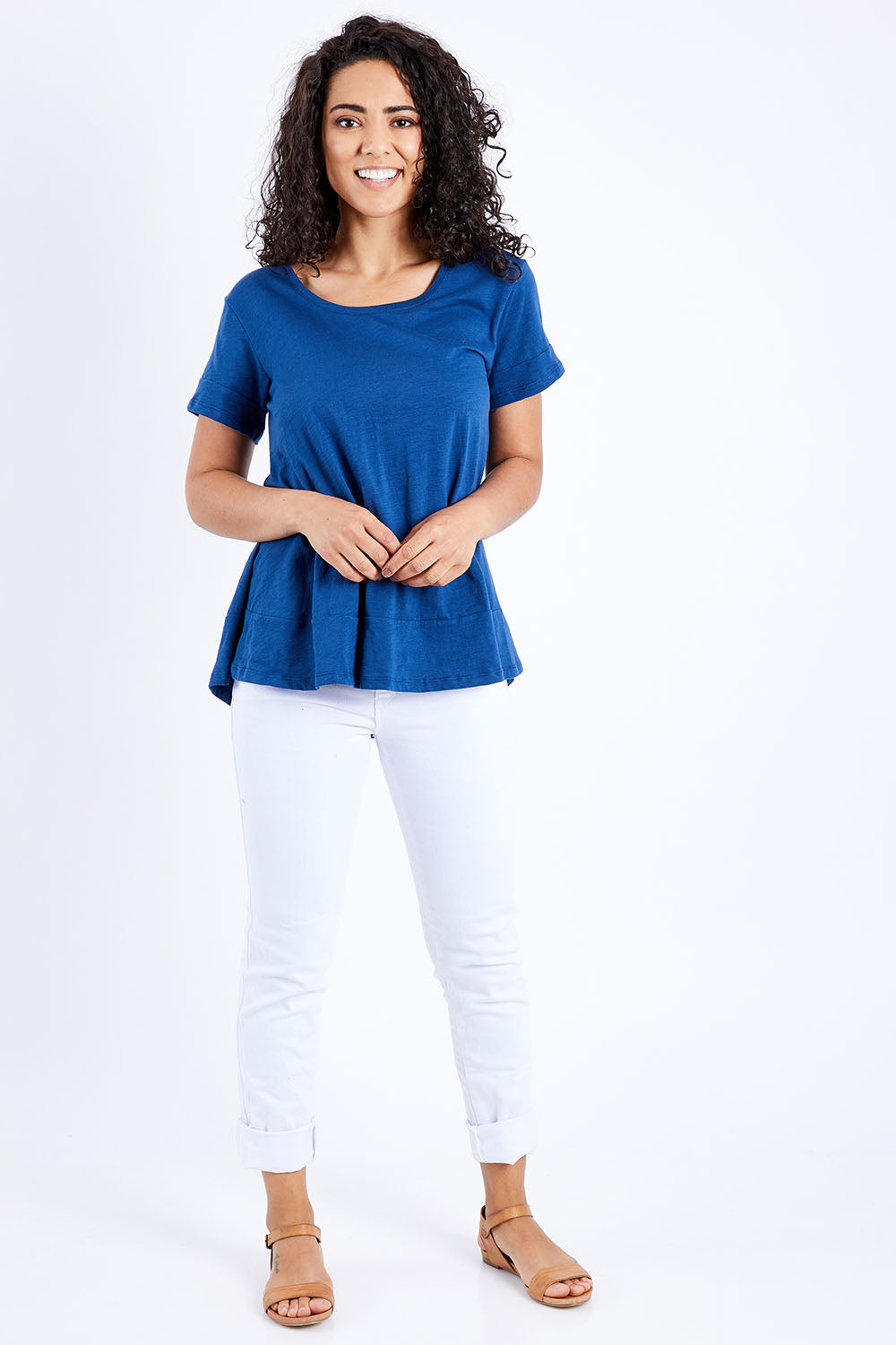 Model Pamela wearing size 10 of The Short Sleeve Swing Tee in colour Navy (Blue), from the front, showing the whole outfit