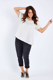 Model Laura wearing size 14 of The Short Sleeve Swing Tee in colour Oatmeal, from the front, showing the whole outfit