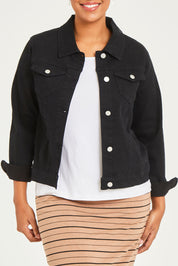 Model Noli wearing size 14 of The Denim Jacket in colour Black (Black), from the front, cropped image