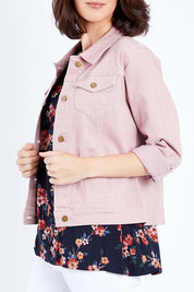 Model Andrea wearing size 10 of The Denim Jacket in colour Dustypink (Pink), from the front, cropped image