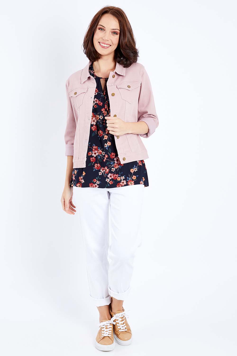 Model Andrea wearing size 10 of The Denim Jacket in colour Dustypink (Pink), from the front, showing the whole outfit