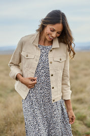 Model Amanda wearing size 10 of The Denim Jacket in colour Echru, from the front, showing the whole outfit