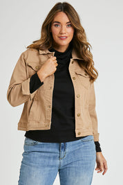 Model Laura wearing size 14 of The Denim Jacket in colour Tan, from the front, cropped image