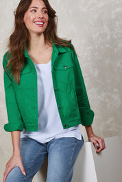 Model Madeline wearing size 10 of The Tencel Blend Denim Jacket in colour Emerald (Green), from the front, cropped image